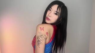 Elle Lee Teases Her Inner Spider Woman in This Exposed Porno Video