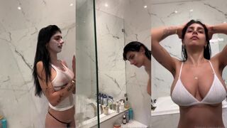 Mia Khalifa Teases in See Thru Tank Top During Steamy Nude Shower Show